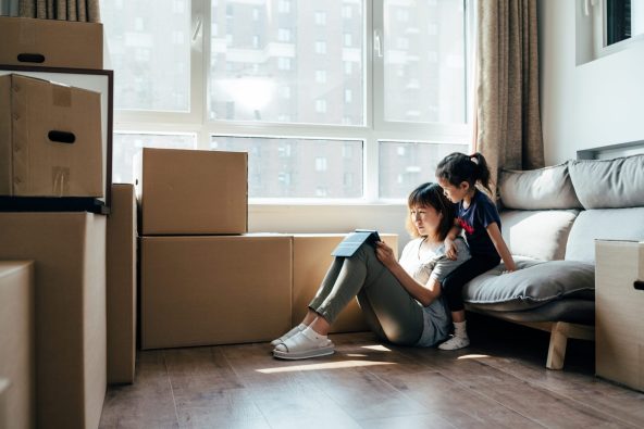 Maid-Bright-Professional-House-Cleaning-Service-Moving-Cleaning-Woman-and-Child-Moving-Boxes-Thumbnail