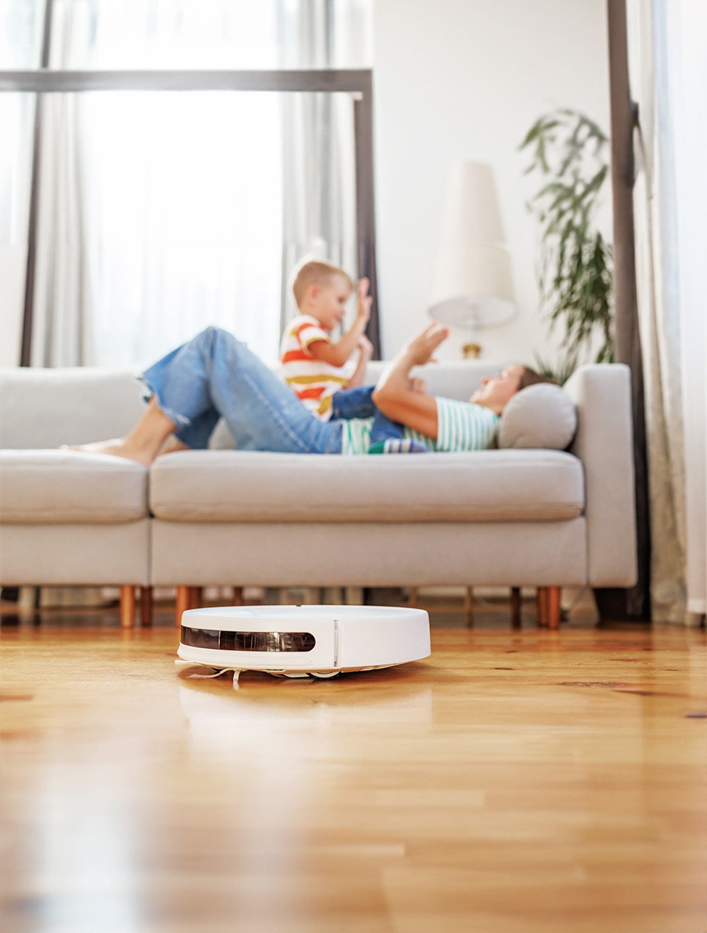 robot vacuum on hardwood floor